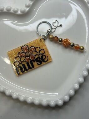 Nurse Keychain with Orange Glitter Floral Tag